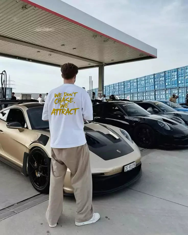 Man wearing a luxury design oversized shirt for men with old money aesthetic, styled with baggy pants and minimalist accessories.