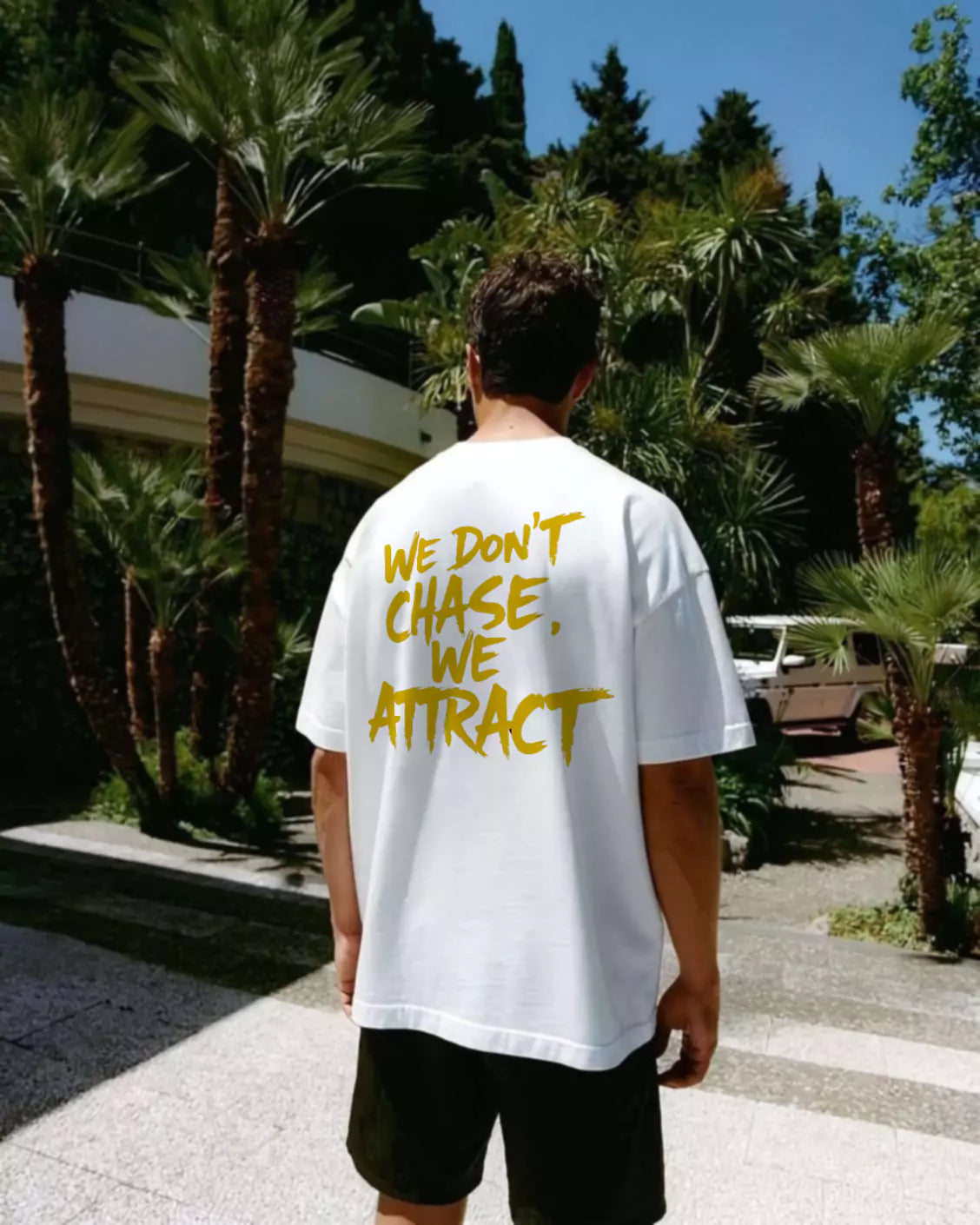 Statement Tee – "We Don’t Chase. We Attract" - Motivational Tee Shirts Oversized Tees - Elevate Your Style Today! Alex Shogun Men's Clothes