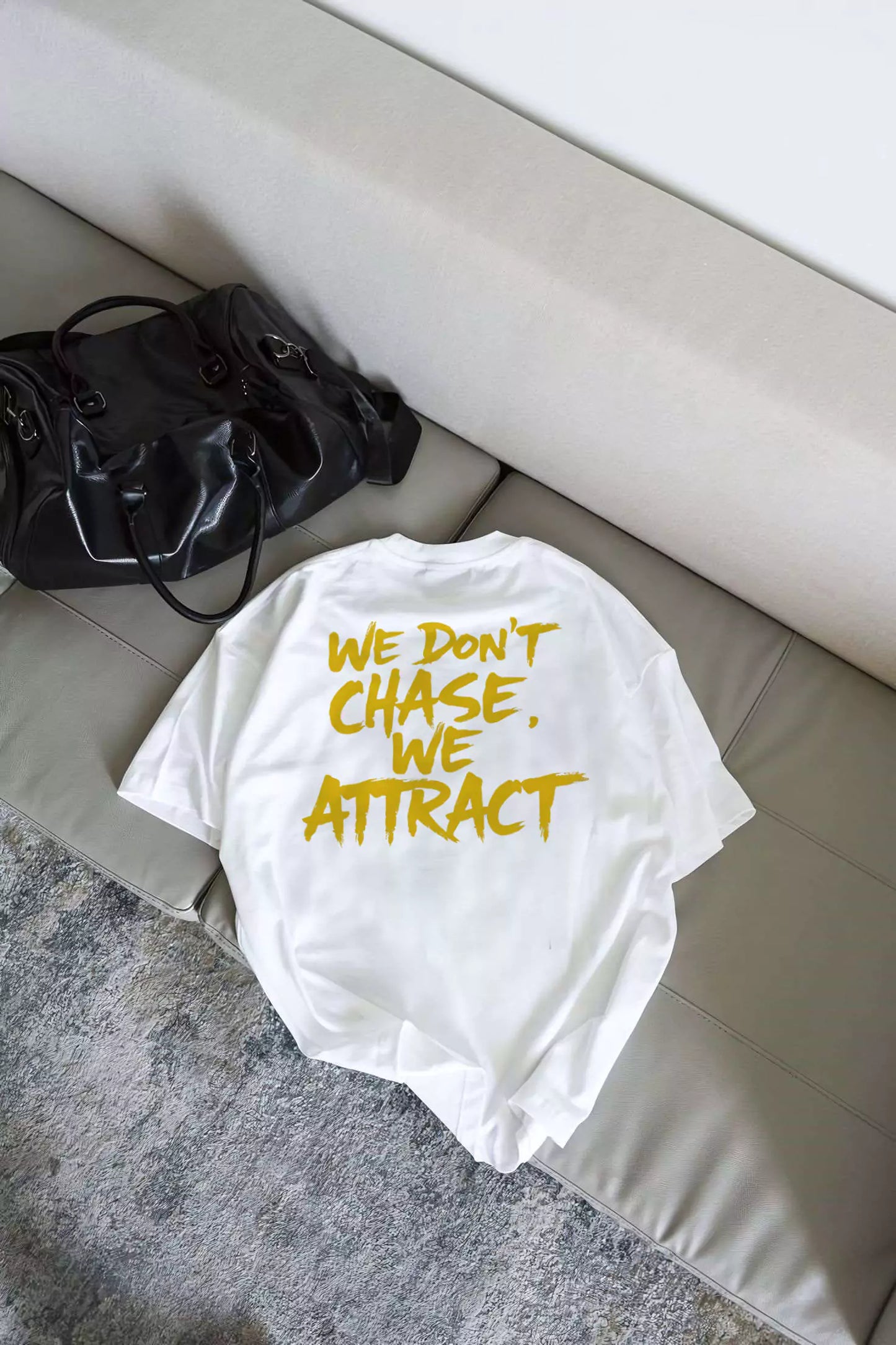 Statement Tee – "We Don’t Chase. We Attract" - Motivational Tee Shirts Oversized Tees - Elevate Your Style Today! Alex Shogun Men's Clothes