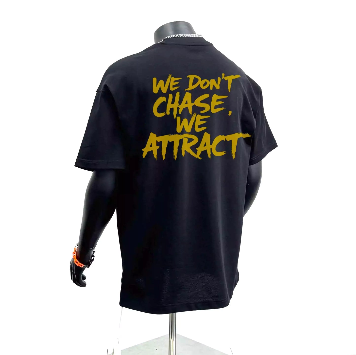 Statement Tee – "We Don’t Chase. We Attract" - Motivational Tee Shirts Oversized Tees - Elevate Your Style Today! Alex Shogun Men's Clothes