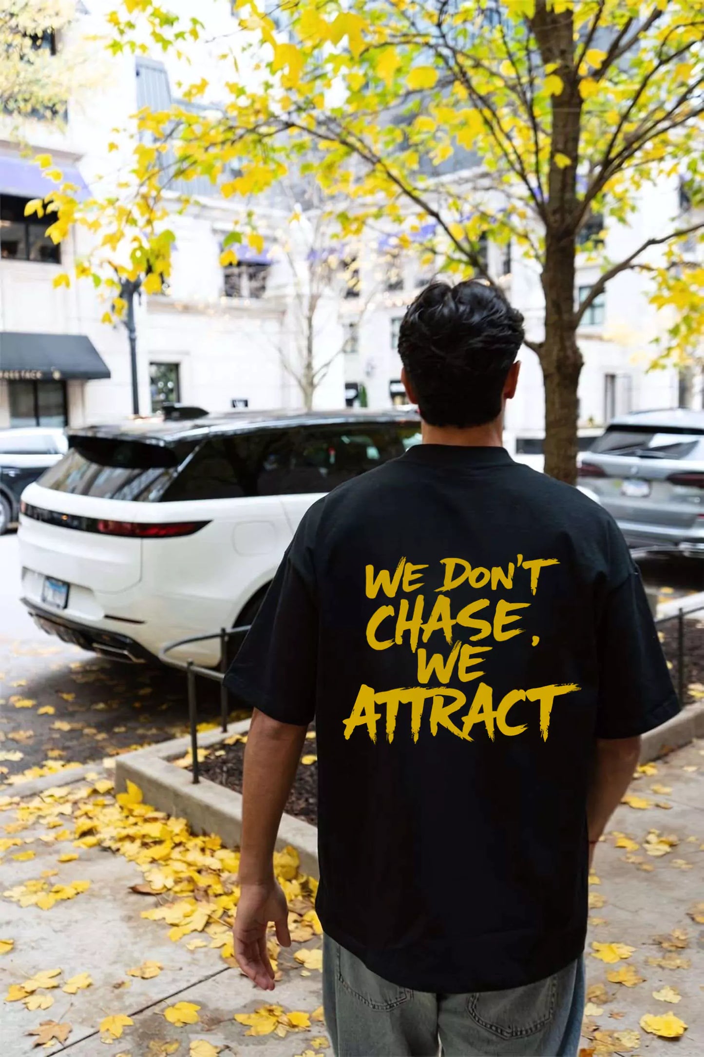 Statement Tee – "We Don’t Chase. We Attract" - Motivational Tee Shirts Oversized Tees - Elevate Your Style Today! Alex Shogun Men's Clothes