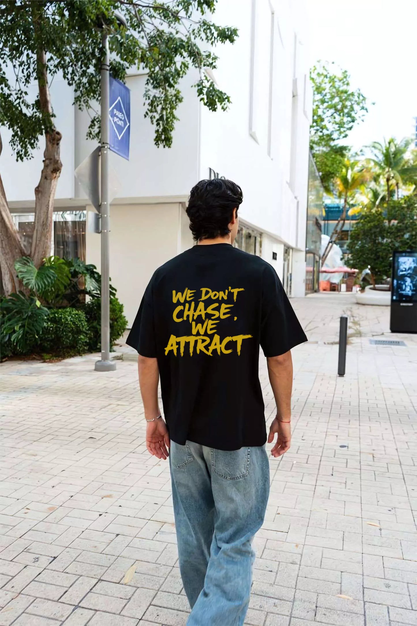 Statement Tee – "We Don’t Chase. We Attract" - Motivational Tee Shirts Oversized Tees - Elevate Your Style Today! Alex Shogun Men's Clothes