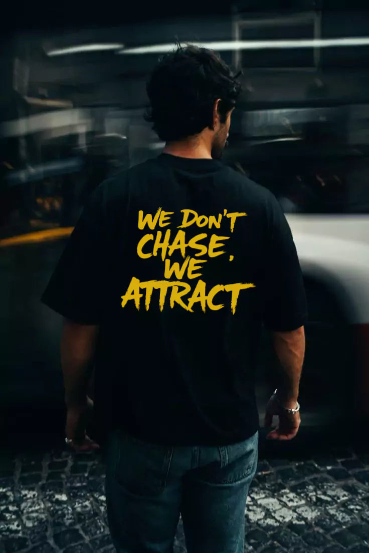 Statement Tee – "We Don’t Chase. We Attract" - Motivational Tee Shirts Oversized Tees - Elevate Your Style Today! Alex Shogun Men's Clothes