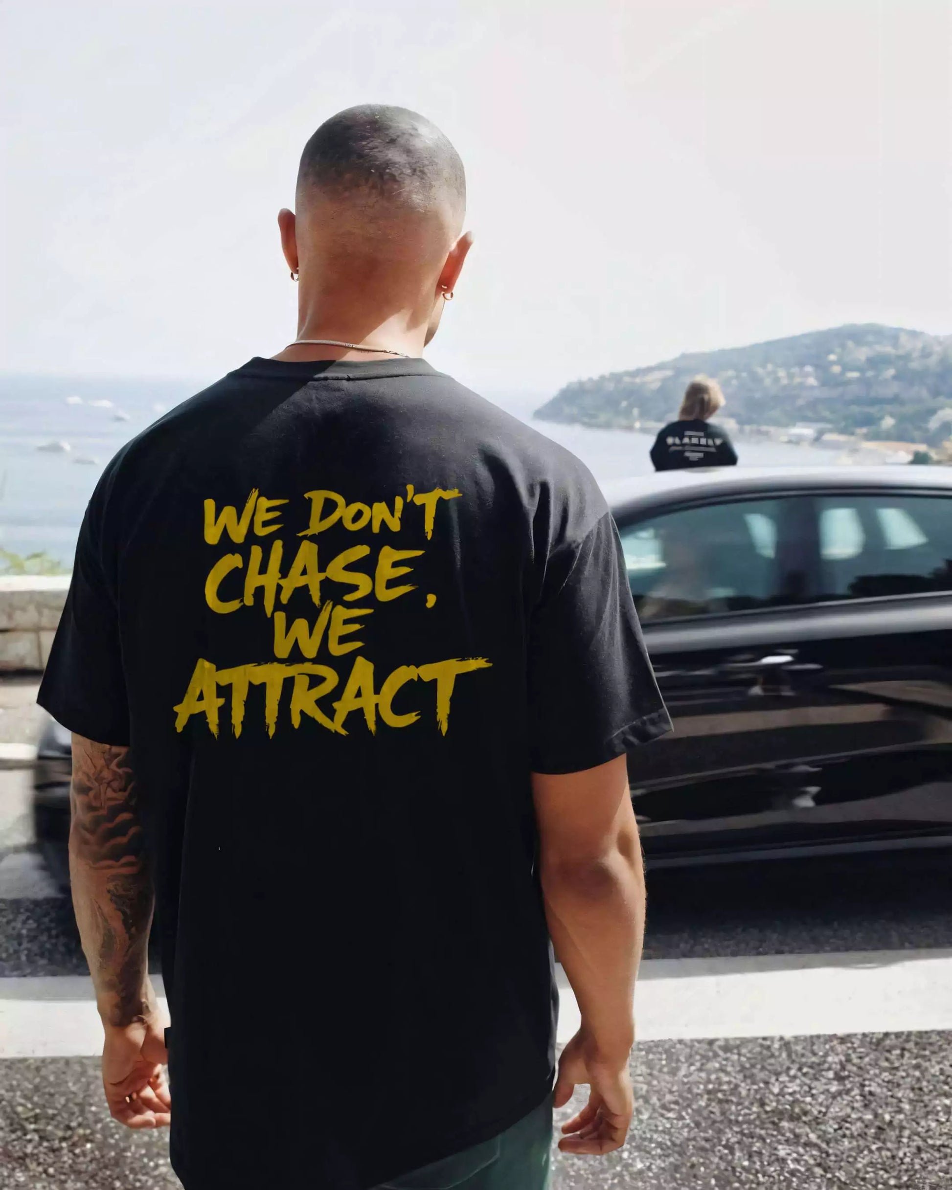 Statement Tee – "We Don’t Chase. We Attract" - Motivational Tee Shirts Oversized Tees - Elevate Your Style Today! Alex Shogun Men's Clothes